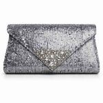 Clutch lentejuela plata plomo modelo Anais tipo sobre con detalle triangular en plata vieja y cristal