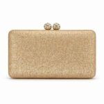 Clutch rígido oro rosa brillante modelo Paulina con cierre de doble bola de cristales