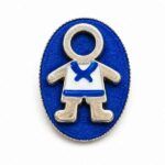 Broche Ejeánico pintado a mano sobre base de camafeo en plata vieja y fieltro azul, diseño exclusivo de Turquesa y Más