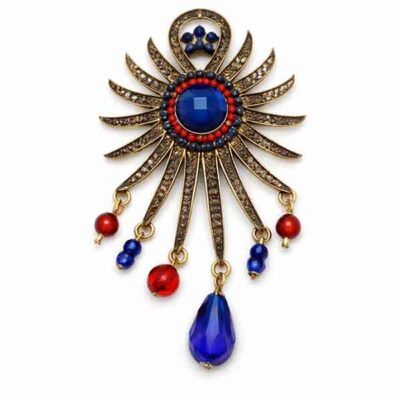 Broche Sol Kanpur en oro viejo con piedra azul central y abalorios rojos y azules