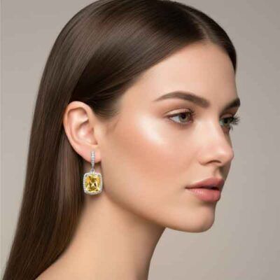 modelo con pendientes Euria plata con circonita paparadscha de Luxenter