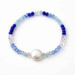 Pulsera azul con perla Océano artesanal hecha a mano