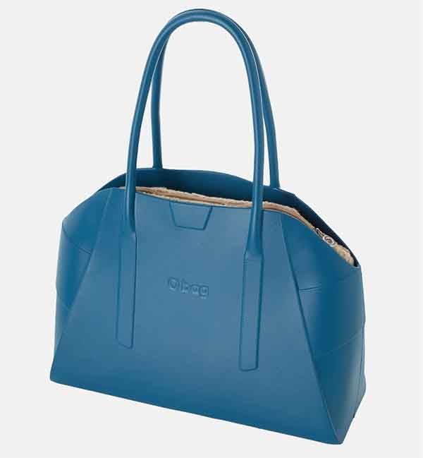 Vista lateral del bolso O bag Unique laguna blue, color suave y cuerpo estructurado