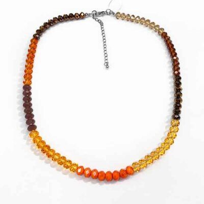 Collar Luz de Otoño de cristal facetado en tonos ámbar, miel y naranja sobre fondo blanco