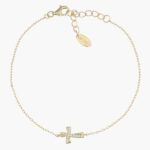 Pulsera cruz ondulada con circonitas blancas bañada en oro